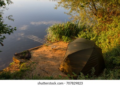 Carp Angling scenic landscape overlooking lake at Dawn