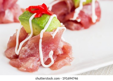 Carpaccio Of Ahi Tuna Topped With Avocado And Pickled Ginger, Drizzled With Aioli