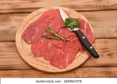 Carpaccio Dish Of Thinly Sliced Pieces (slices) Raw Beef Tenderloin 