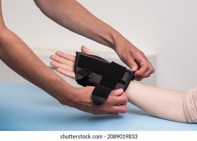 Carpal orthosis or stabilizer is a medical device used to immobilize and support wrist and thumb for treatment of muscle strain and tendinitis. Medical equipment concept.
