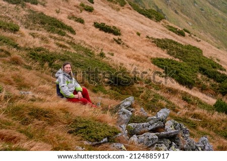 Similar – Foto Bild Junge Frau genießt nordische Landschaft