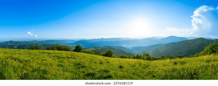 Carpathians mountains landscapes from green meadow on sunset, Apetska mountain, Ukraine - Powered by Shutterstock