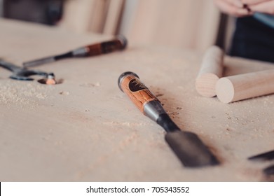 carpenter chisels on the table in the process of making furniture. close