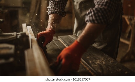 Carpenter Craftsman Working In A Wood Shop