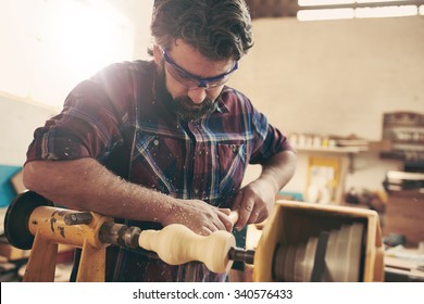 A Carpenter Doing Wood Turning