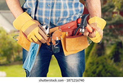 Carpenter with leather gloves. Construction industry work tools. Covid-19. - Shutterstock ID 1871216740