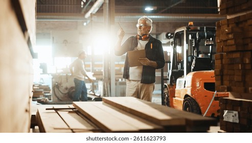 Carpenter, man and clipboard with wood inspection for quality control, stock management or timber count. Manufacturing, mature person and paperwork for carpentry inventory or supply chain in workshop