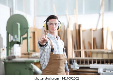 carpenter man touch screen on carpentry background
