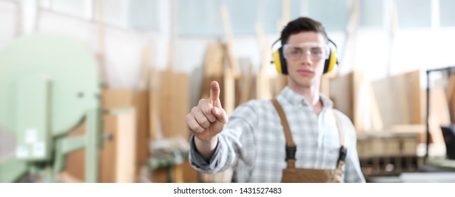 carpenter man touch screen on carpentry background