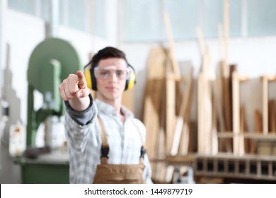 carpenter man touch screen on carpentry background