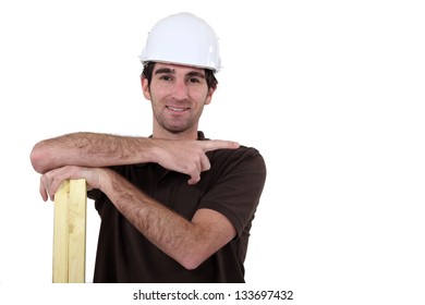 Carpenter pointing to empty copyspace