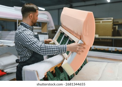 Carpenter skillfully assembling a stylish sofa using foam and wood in a bustling furniture factory, showcasing expert craftsmanship and quality