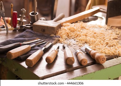 Carpenter tools on wood table background. Top view. Copy space.