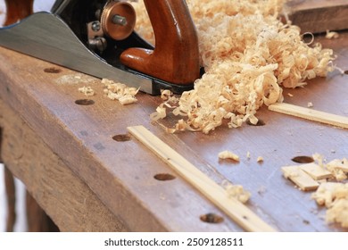 Carpenter tools on a workbench in a carpentry workshop - Powered by Shutterstock