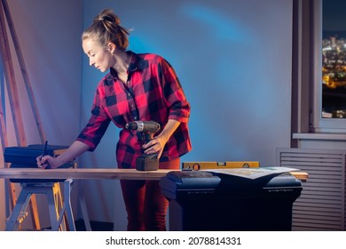 Carpenter Woman. Portrait Of Carpenter With Pencil In His Hand. She Draws Something In Carpentry Workshop. Girl Designer In Work Setting. She Is In Woodworking Workshop. Woman Furniture Maker