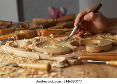 Carpenter Wood Carving Equipment. Woodworking, Craftsmanship And Handwork Concept. Wood Processing. Joinery Work Wood Carving Chisels For Carving On The Woodworker Desk Timber Joinery Work.