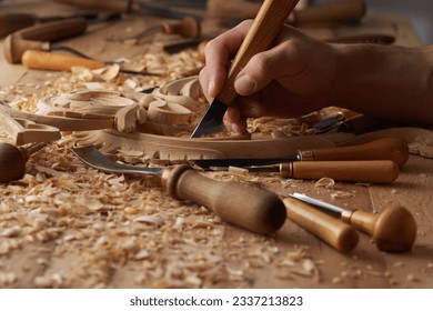 Carpenter wood carving equipment. Woodworking, craftsmanship and handwork concept. Wood processing. Joinery work Wood carving Chisels for carving on the woodworker desk Timber Joinery work. - Powered by Shutterstock