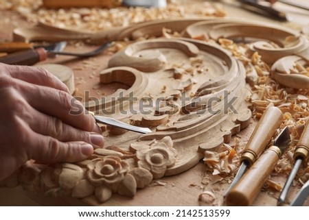 Carpenter wood carving equipment. Woodworking, craftsmanship and handwork concept. Wood processing. Joinery work Wood carving Chisels for carving on the woodworker desk Timber Joinery work.