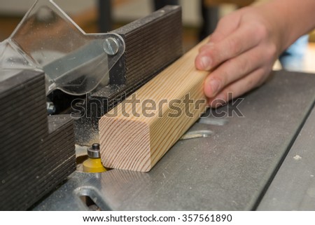 Carpenter working with cutter