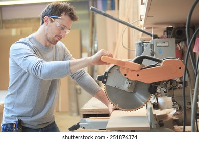 A Carpenter working hard at the shop