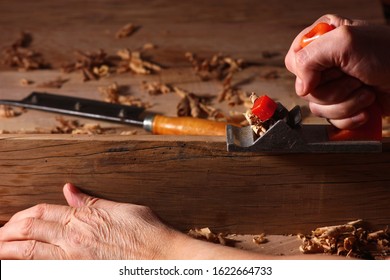 Carpenter's Hands At Work On Wood Processing