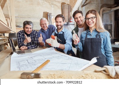 Carpenters team holding thumbs up for motivation - Powered by Shutterstock