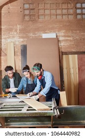 Carpenters Team Working As Part Of Their Apprenticeship