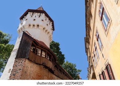 From The Carpenters Tower (Turnul Dulgherilor) begins an approx. 200 m long city wall, which can be entered on an arcade, one can climb up the towers. Sibiu, Romania - Shutterstock ID 2227049257
