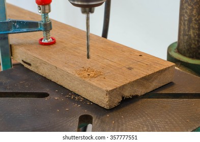 Carpenters are using a the drill machine.