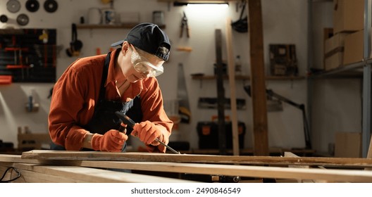 Carpenters work. Handyman with chisel and hammer. Carpenter tools and woodworker. Copy space - Powered by Shutterstock