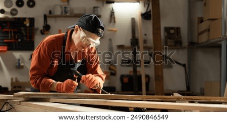 Carpenters work. Handyman with chisel and hammer. Carpenter tools and woodworker. Copy space