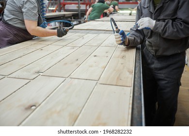 Carpenters Working On Wood Factory With Machines. Wooden Furniture Manufacturing Process. Carpentry Workshop Location.