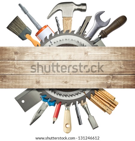 Carpentry, construction collage. Tools underneath wooden planks.