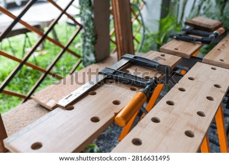 Carpentry timber modification equipment clamp workbench woodcraft hardware workshop renovation craftsmanship maintenance production precision mechanic project tool apparatus