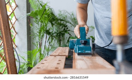 Carpentry timber modification equipment motor planer woodcraft construction hardware workshop renovation craftsmanship maintenance production precision mechanic project tool