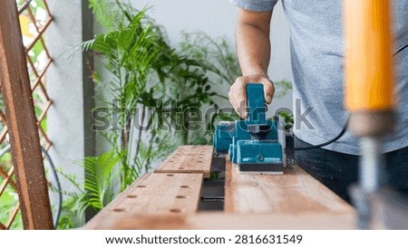 Carpentry timber modification equipment motor planer woodcraft construction hardware workshop renovation craftsmanship maintenance production precision mechanic project tool