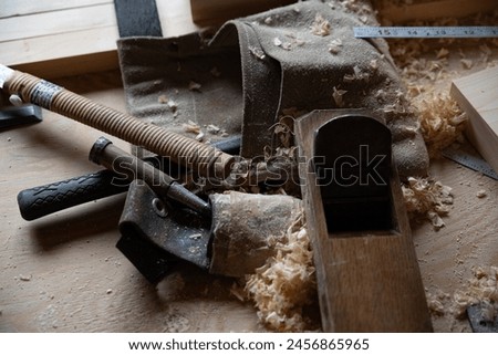 carpentry tools on a bench in the workshop
