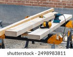 Carpentry Tools and Timber on a Workbench in a Workshop Setting