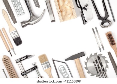 carpentry and woodwork tools on white background. carpenter working table. frame composition with copy space top view - Shutterstock ID 411155899