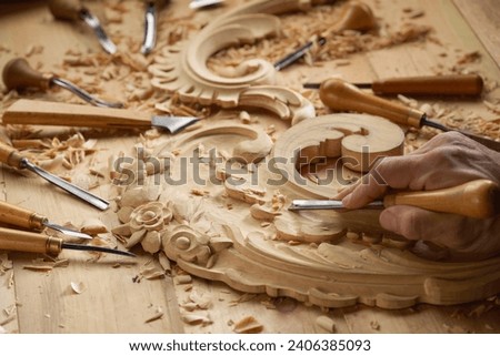 Carpentry workshop with different tools on a table. Craftsmanship and skill involved in woodworking.
