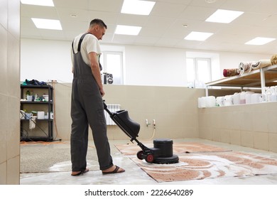 Carpet chemical cleaning with professionally disk machine. Early spring cleaning or regular clean up. - Shutterstock ID 2226640289