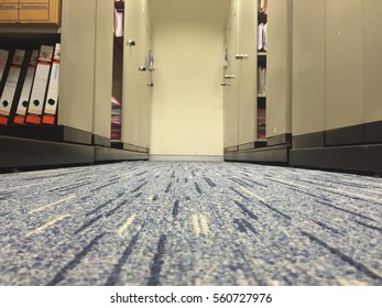 Carpet Floor And Filing Cabinet In A Office, Select Focus On The Floor