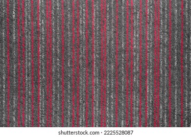 Carpet red grey pattern lines striped abstract material fabric texture background.