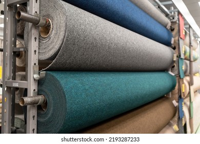 Carpet rolls for sale in a store - Shutterstock ID 2193287233
