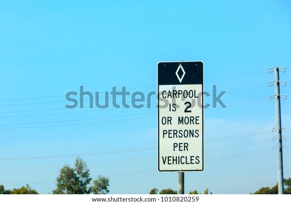 Carpool is 2 or\
more persons per vehicles\
sign