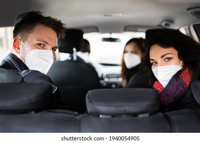 Carpool Ride Share. Friends Enjoy Taxi In Face Mask