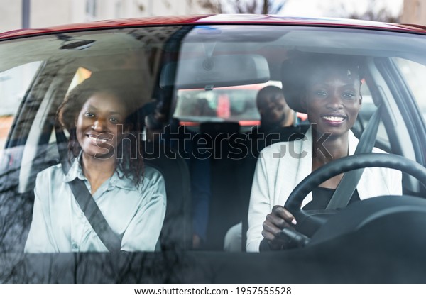 Carpool\
Ride Share Service App. Group Of African\
Friends