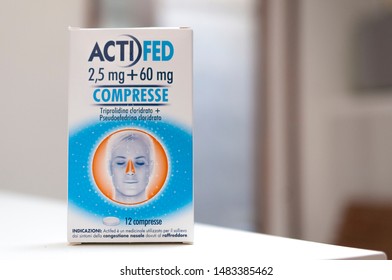 Carrara, Italy - August 20, 2019 - Box Of Actifed Tablets. Actifed Is A Medicine For Relief From The Symptoms Of Nasal Congestion And The Common Cold.