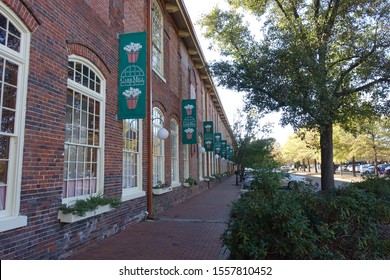 CARRBORO, NC - November 10, 2019: The Converted Cotton Mill Serves as a Multi-Use Space for Shops, Offices, Cafes and a Grocery Store Co-Op