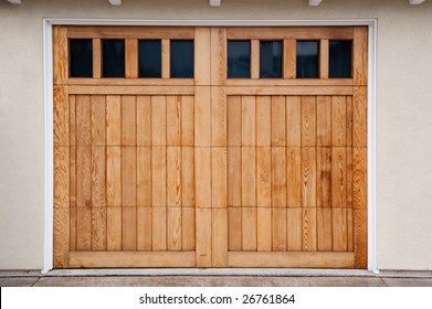 Carriage Style Garage Doors Of A Contemporary Home.